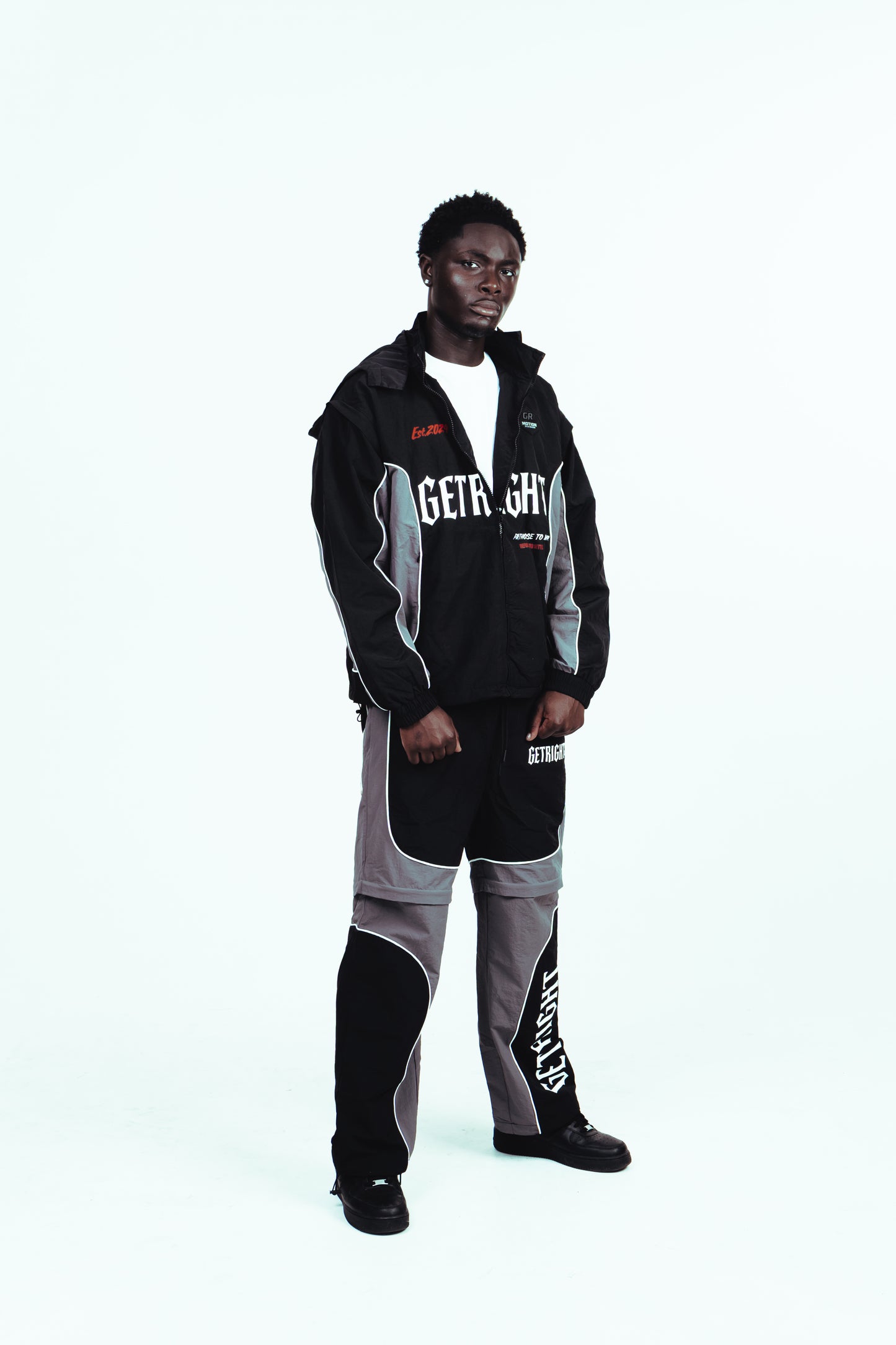 MOTION DIVISION TRACK PANTS – BLACK