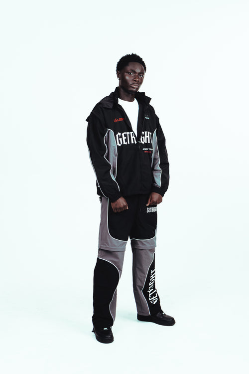 MOTION DIVISION TRACK PANTS – BLACK